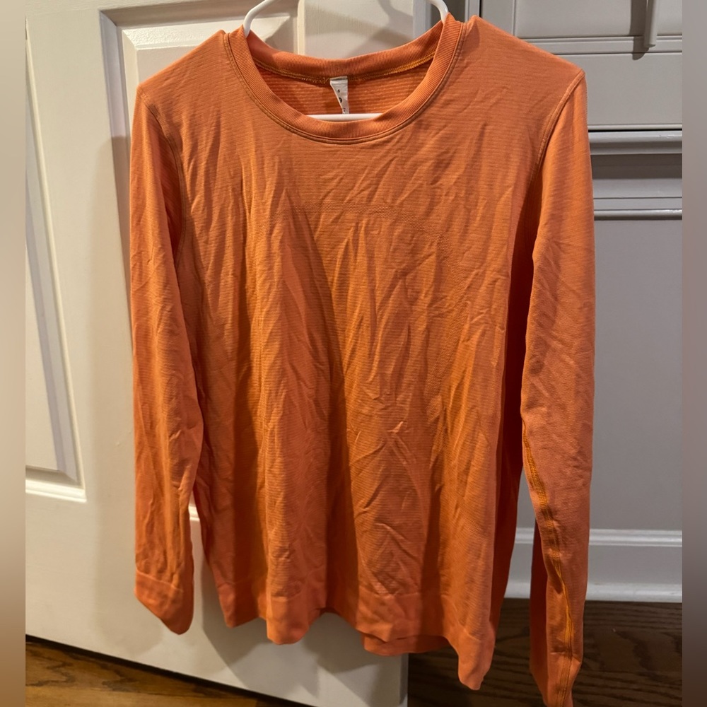 Lulu orange loose swiftly tech long sleeve